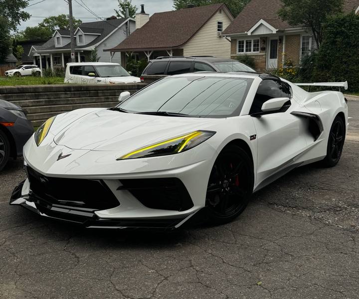 White Corvette C8 with tinted headlight film installed by KAMO Tints