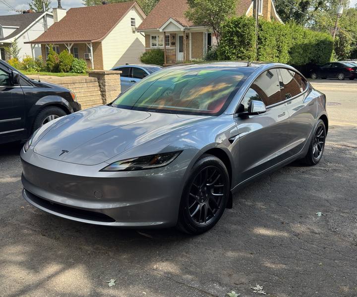 Grey Tesla Model 3 with freshly tinted windows at KAMO Tints in Laval