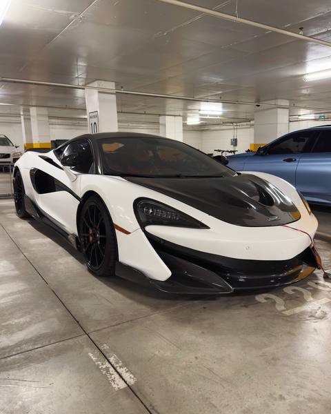 White McLaren with paint protection film